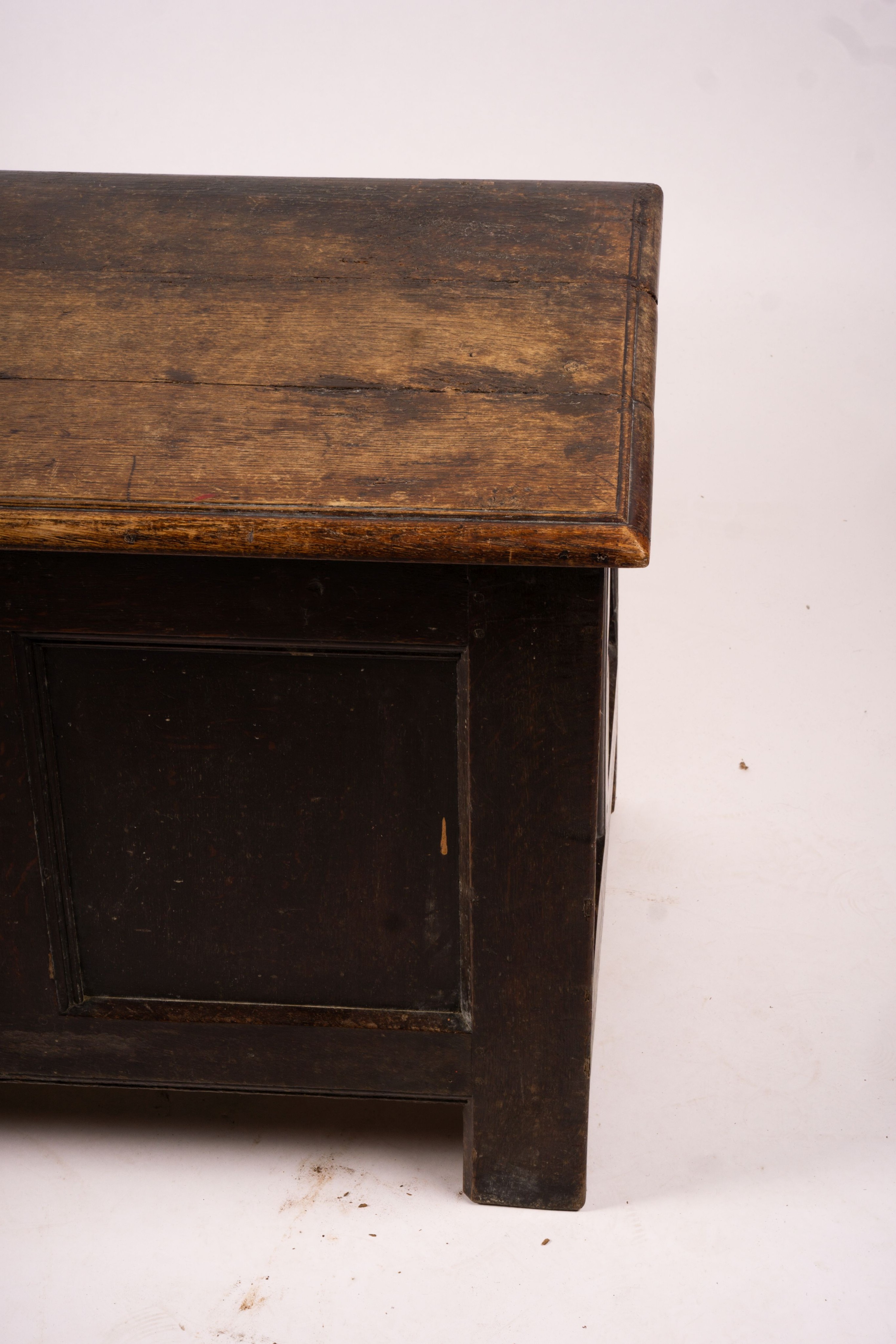 A 17th century panelled oak coffer, length 136cm, depth 56cm, height 64cm